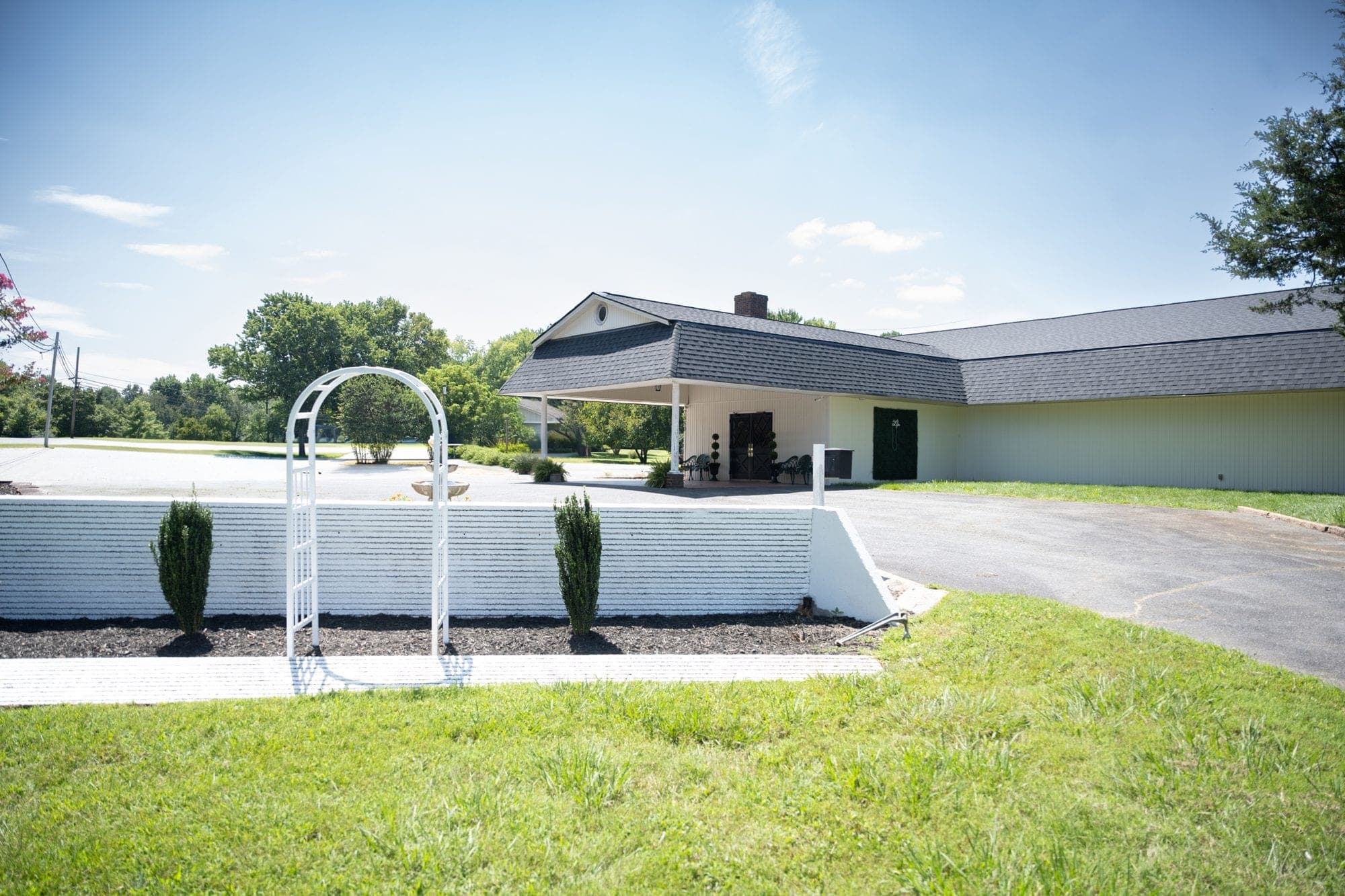 The Becker Hill Events venue with its lawn and wedding arch