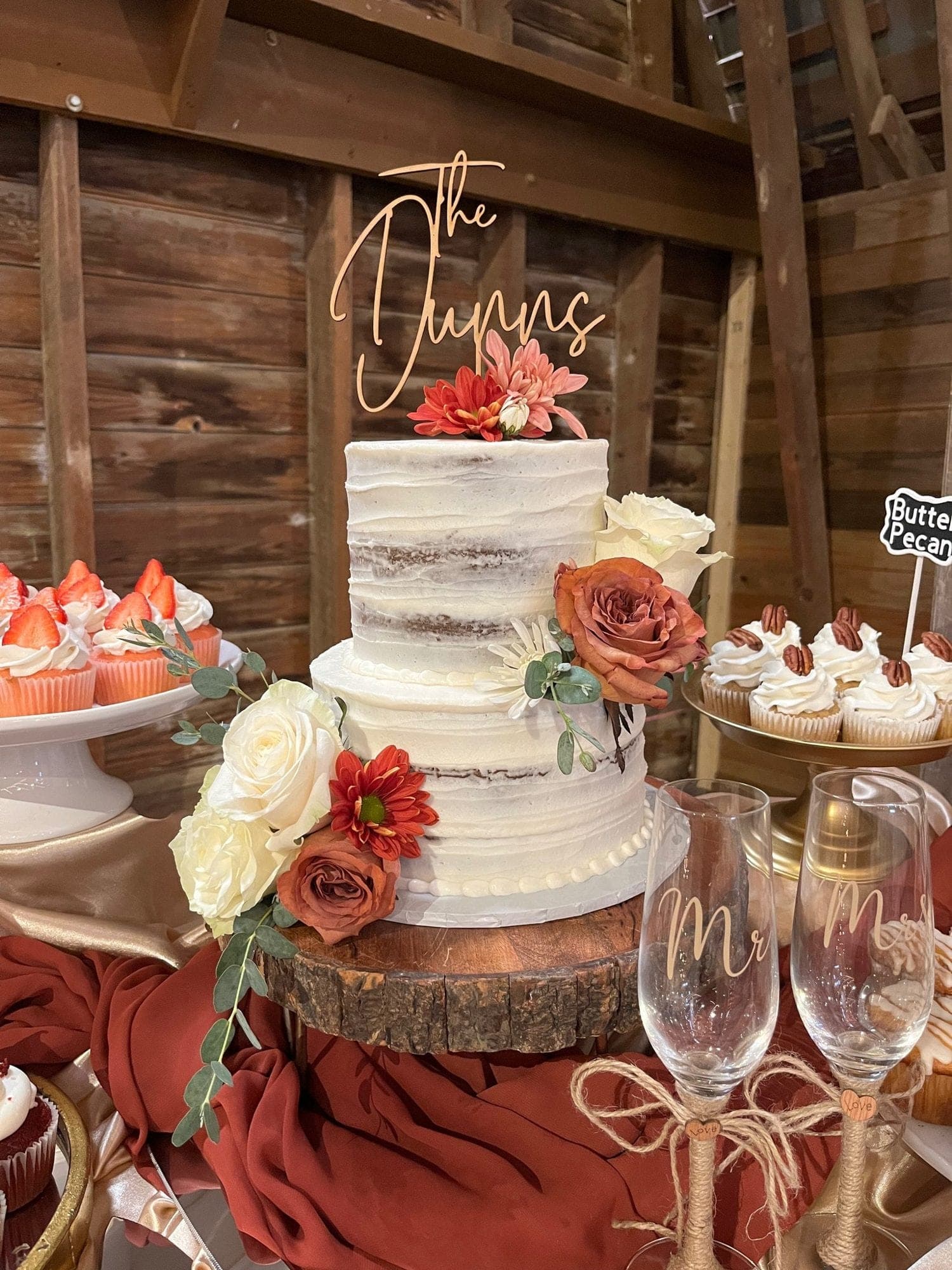 Semi-naked wedding cake with terracotta roses